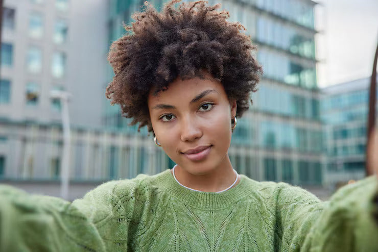 files/serious-beautiful-young-woman-stretches-arms-makes-selfie-walk-urban-setting-wears-casual-green-jumper-has-confident-look-camera-female-blogger-records-video-front-camera_273609-56681.jpg